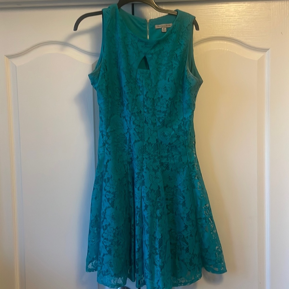 Turquoise lace dress with gold zipper down the back